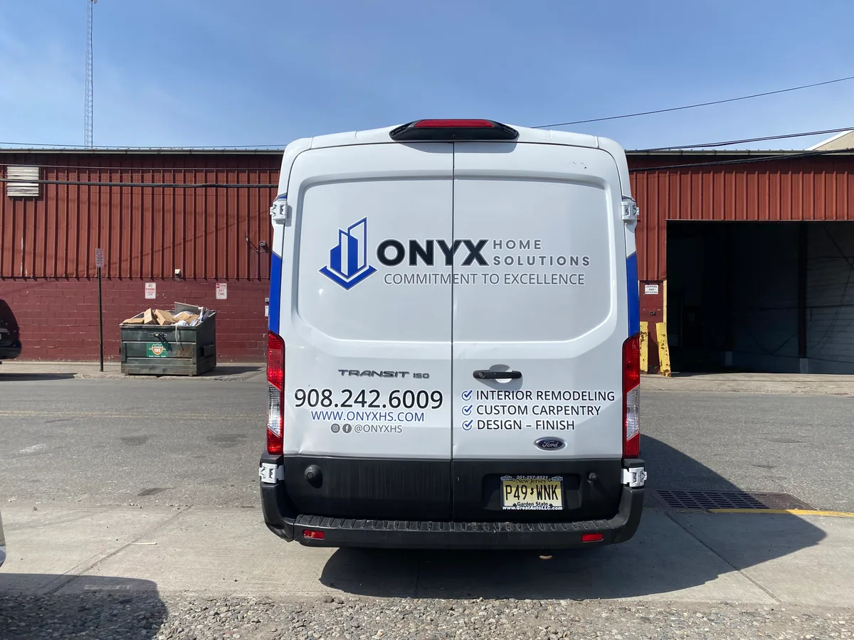 Spot graphics on a Ford Transit 150 van in Jersey City, NJ