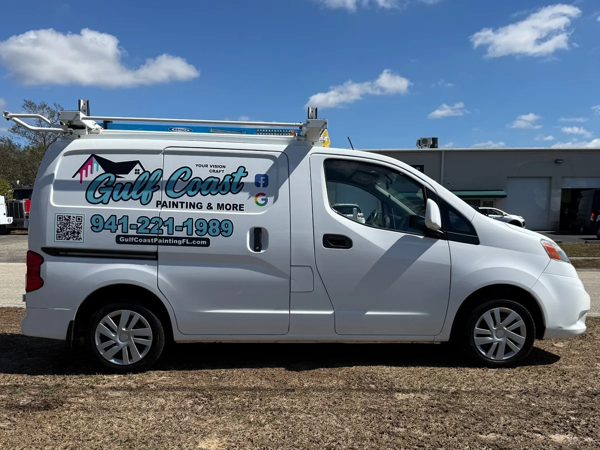 Spot graphics on a Nissan NV200 van in North Port, FL