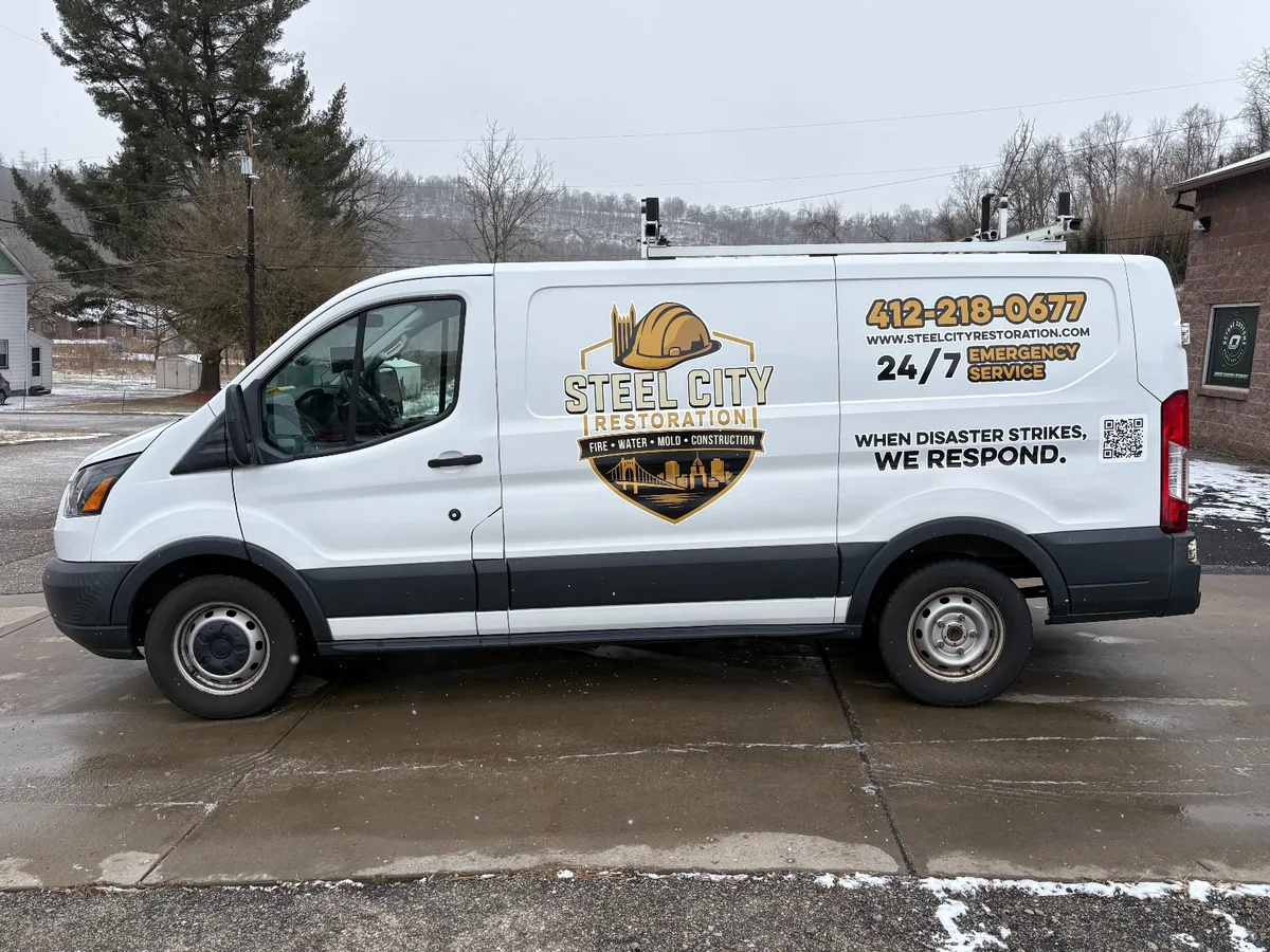 Spot graphics on a Ford Transit cargo van in Pittsburgh, PA