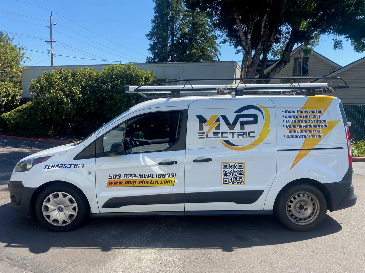 Spot graphics on a Ford Transit Connect van in Portland, OR