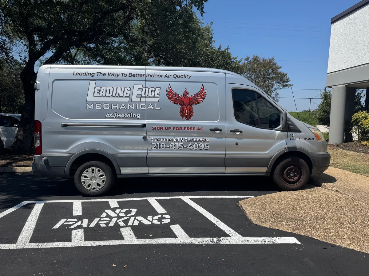 Spot graphics on a Ford Transit van in San Antonio, TX