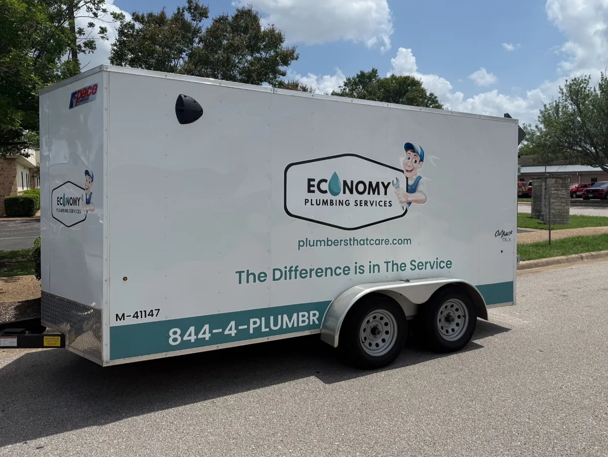 Spot graphics on a PACE American OutBack DLX trailer in Austin, TX