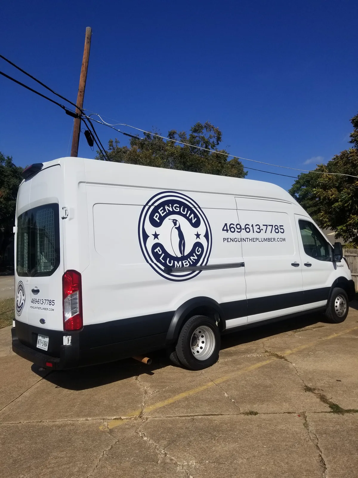 Spot graphics on a Ford Transit van in Plano, TX