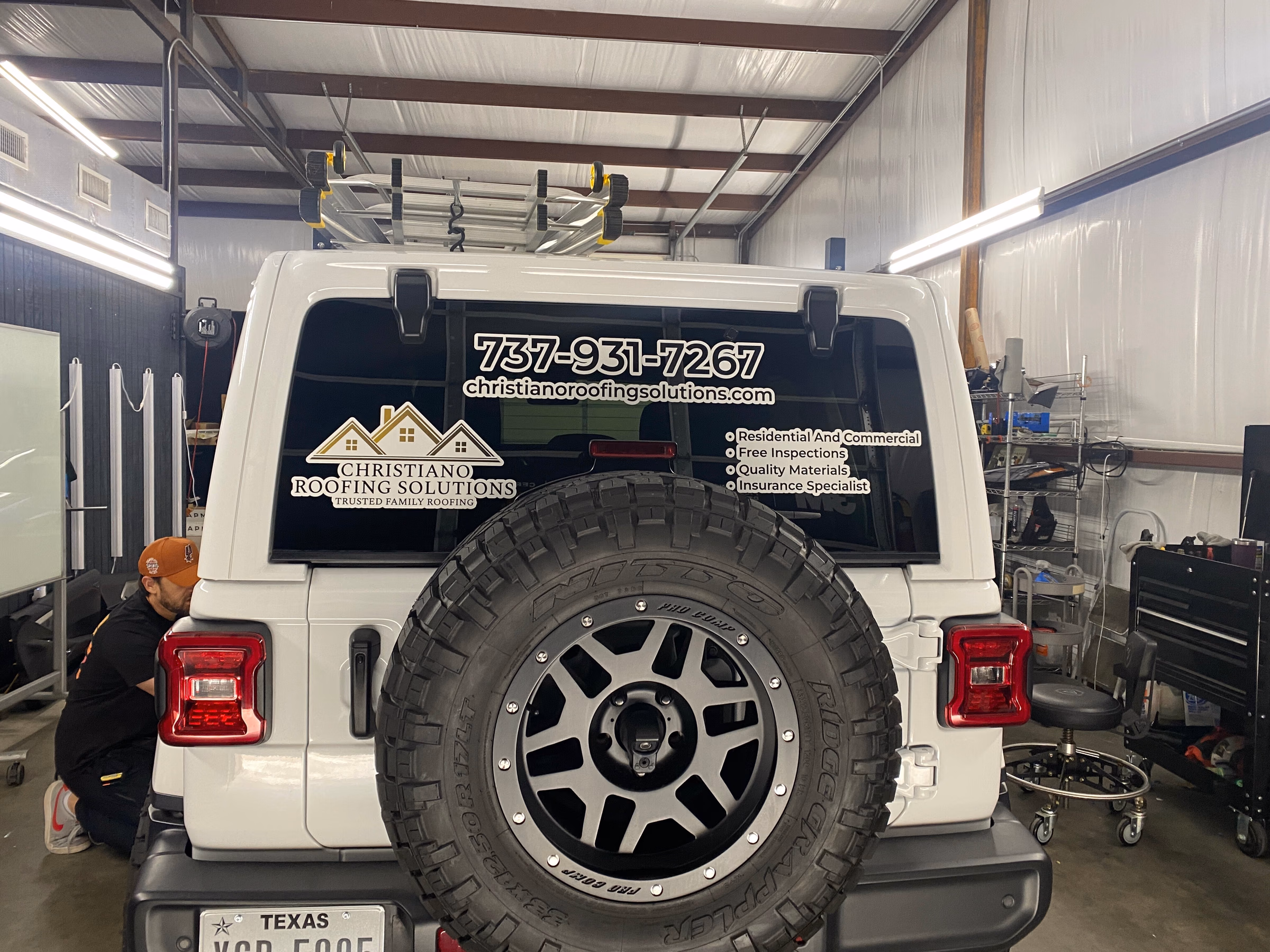 Christiano Roofing Solutions vehicle wrap in Austin, TX
