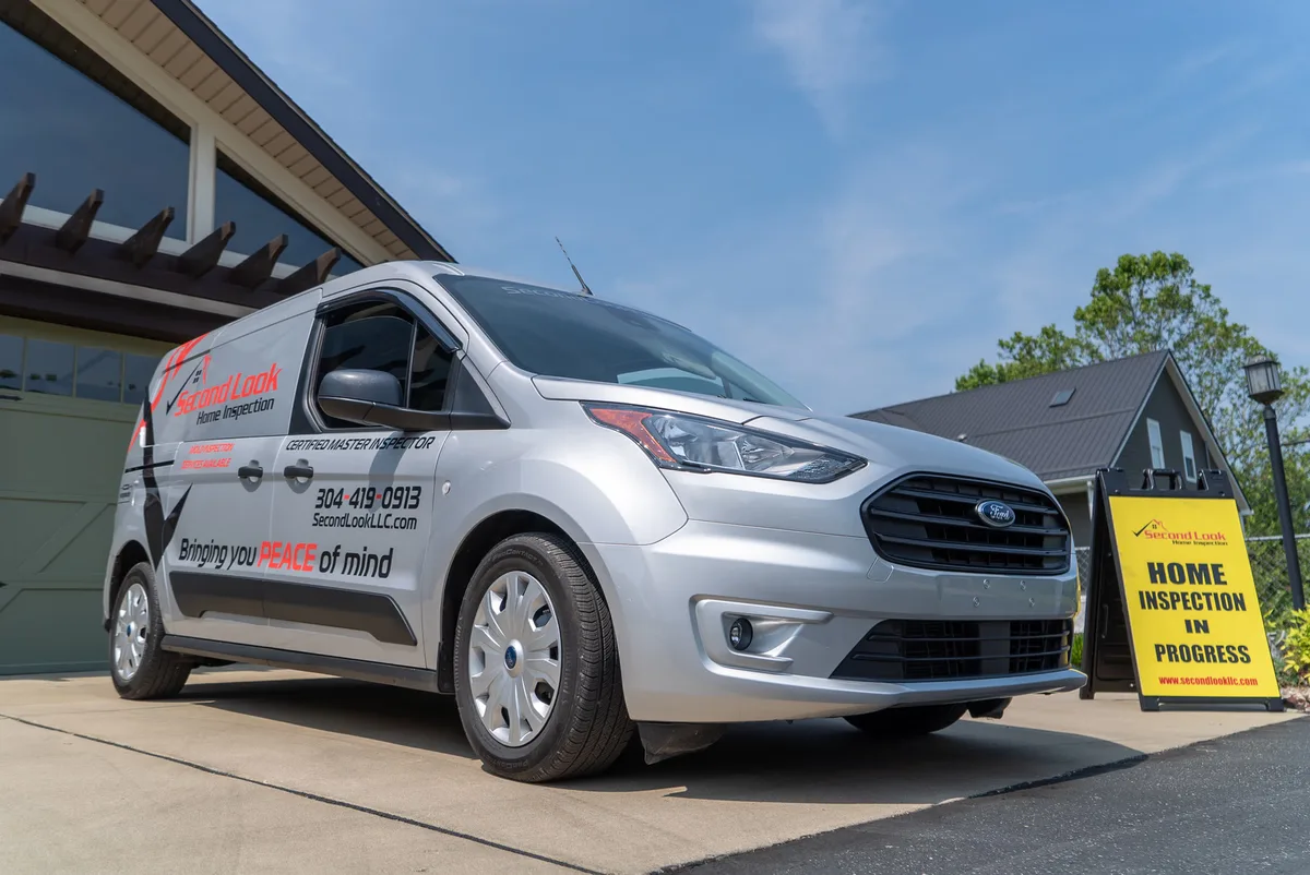 Spot graphics on a Ford Transit Connect van in Charleston, WV