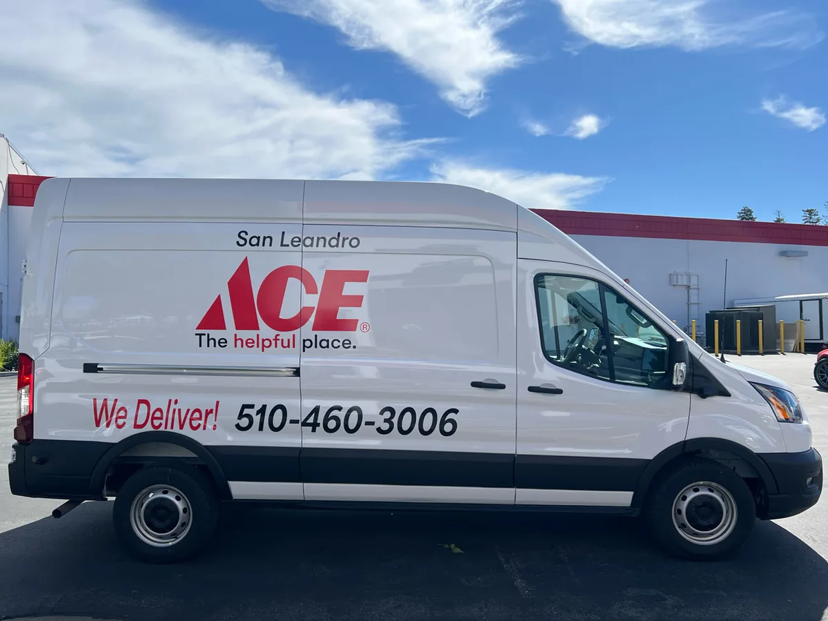 Spot graphics on a Ford Transit van in Livermore, CA