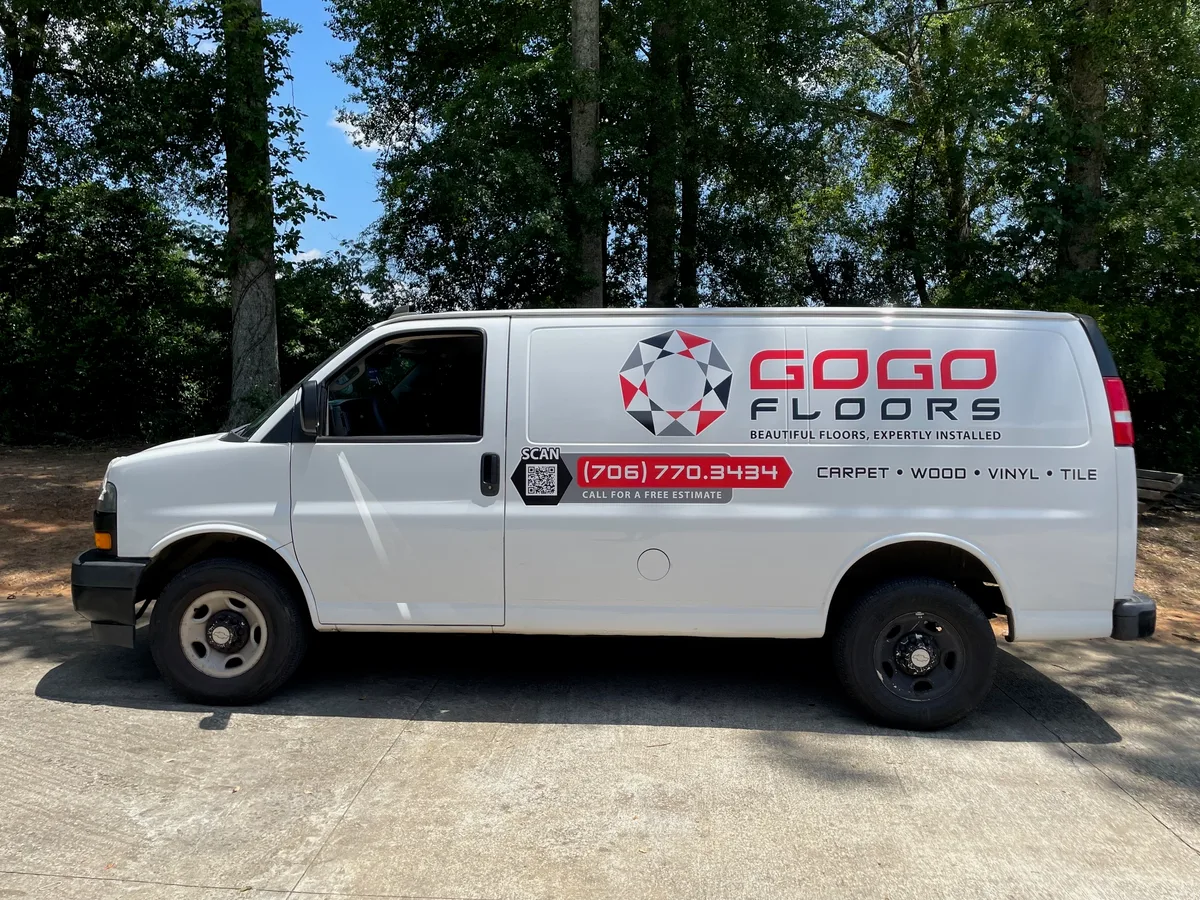 Spot graphics on a Chevrolet Express van in Columbus, GA