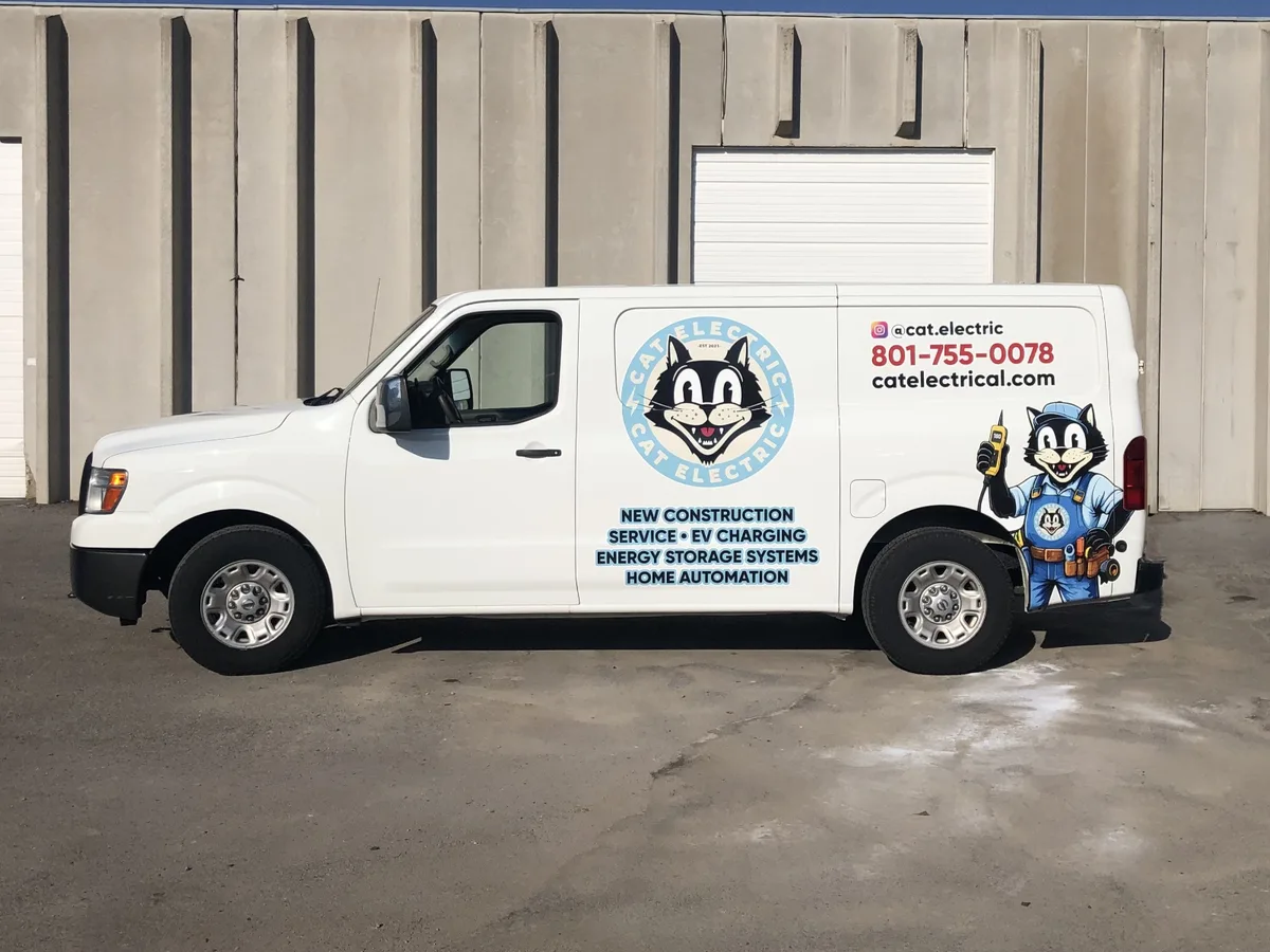 Spot graphics on a Nissan NV200 van in Sandy, UT