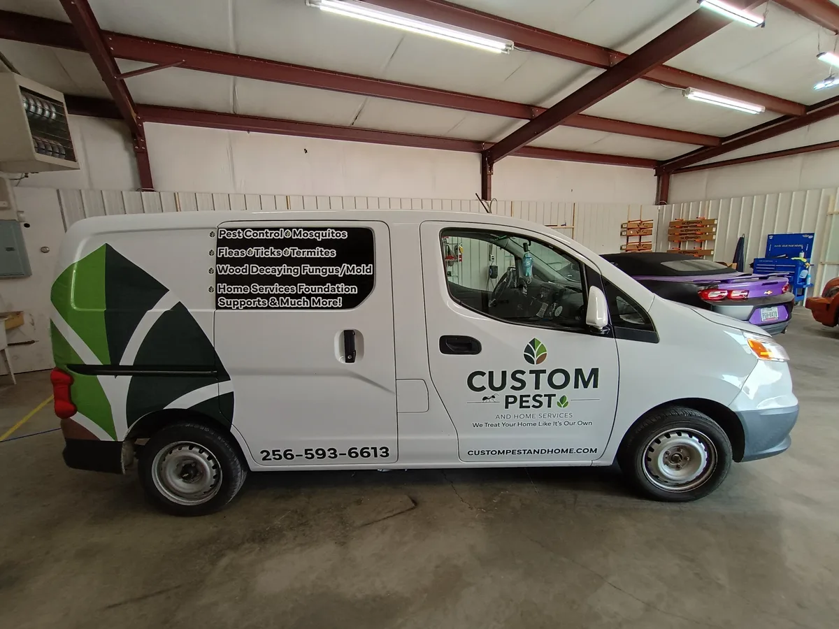 Spot graphics on a Nissan NV200 van in Boaz, AL