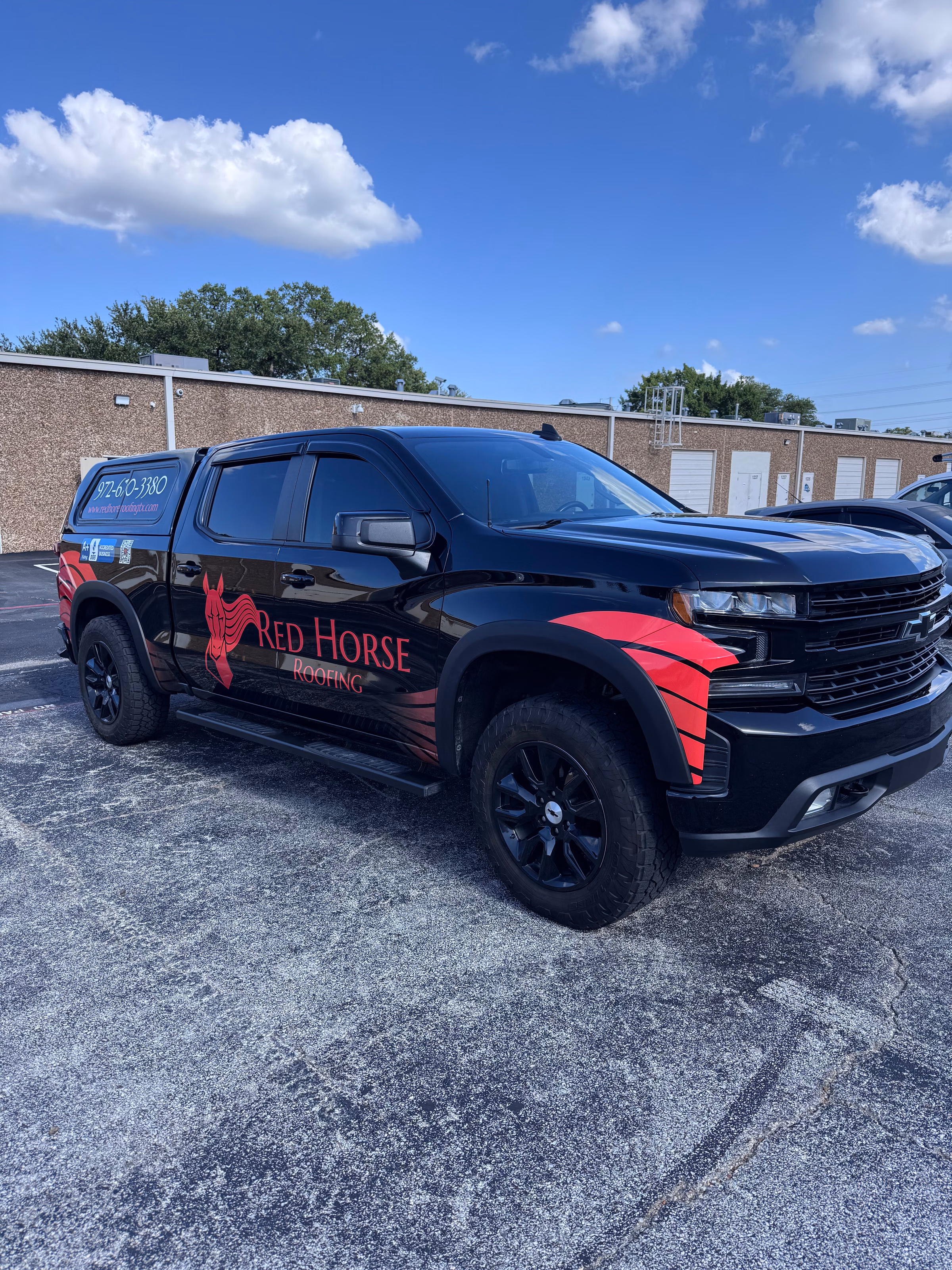 Red Horse Roofing vehicle wrap in Garland, TX