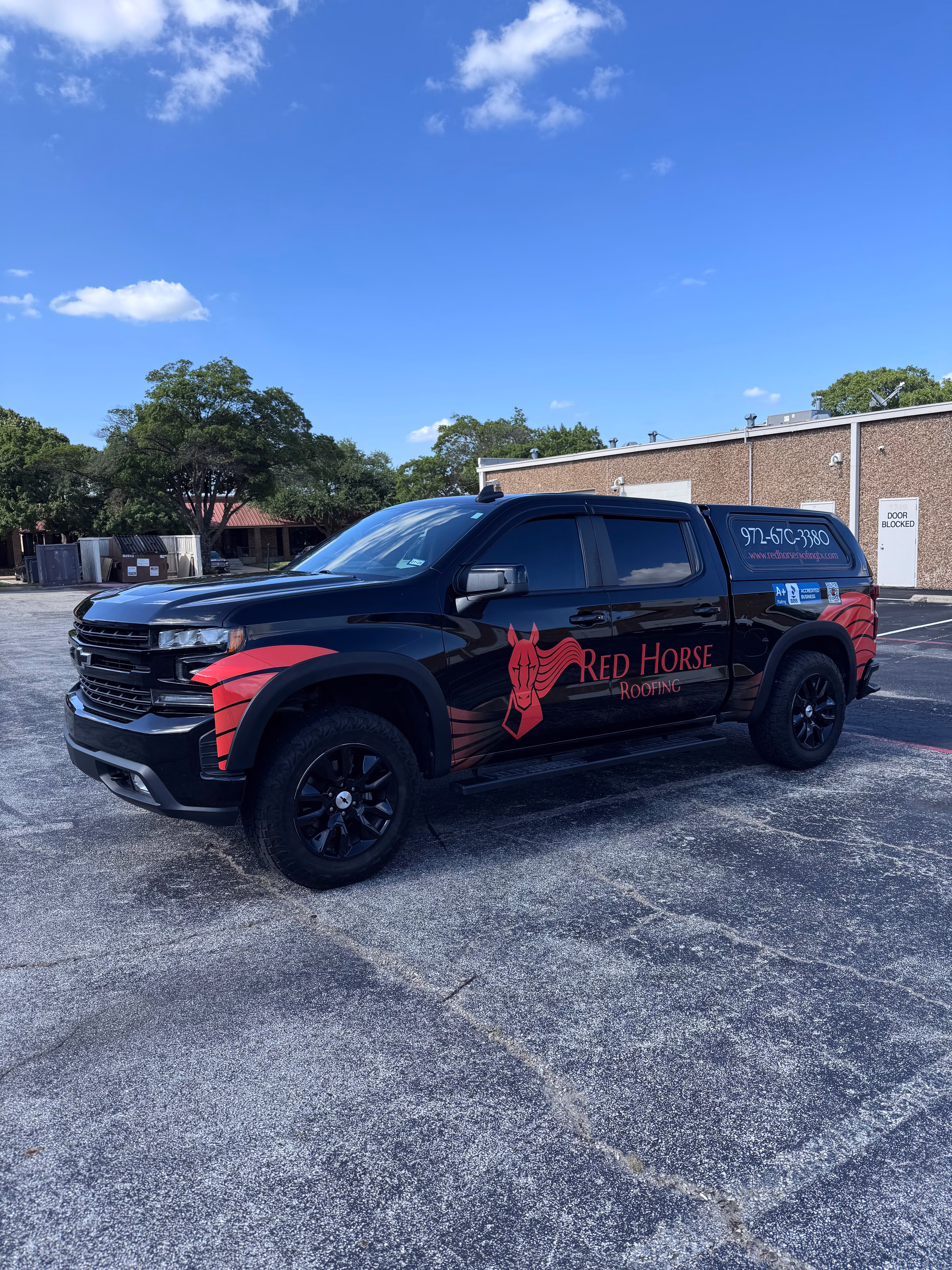 Red Horse Roofing vehicle wrap in Garland, TX
