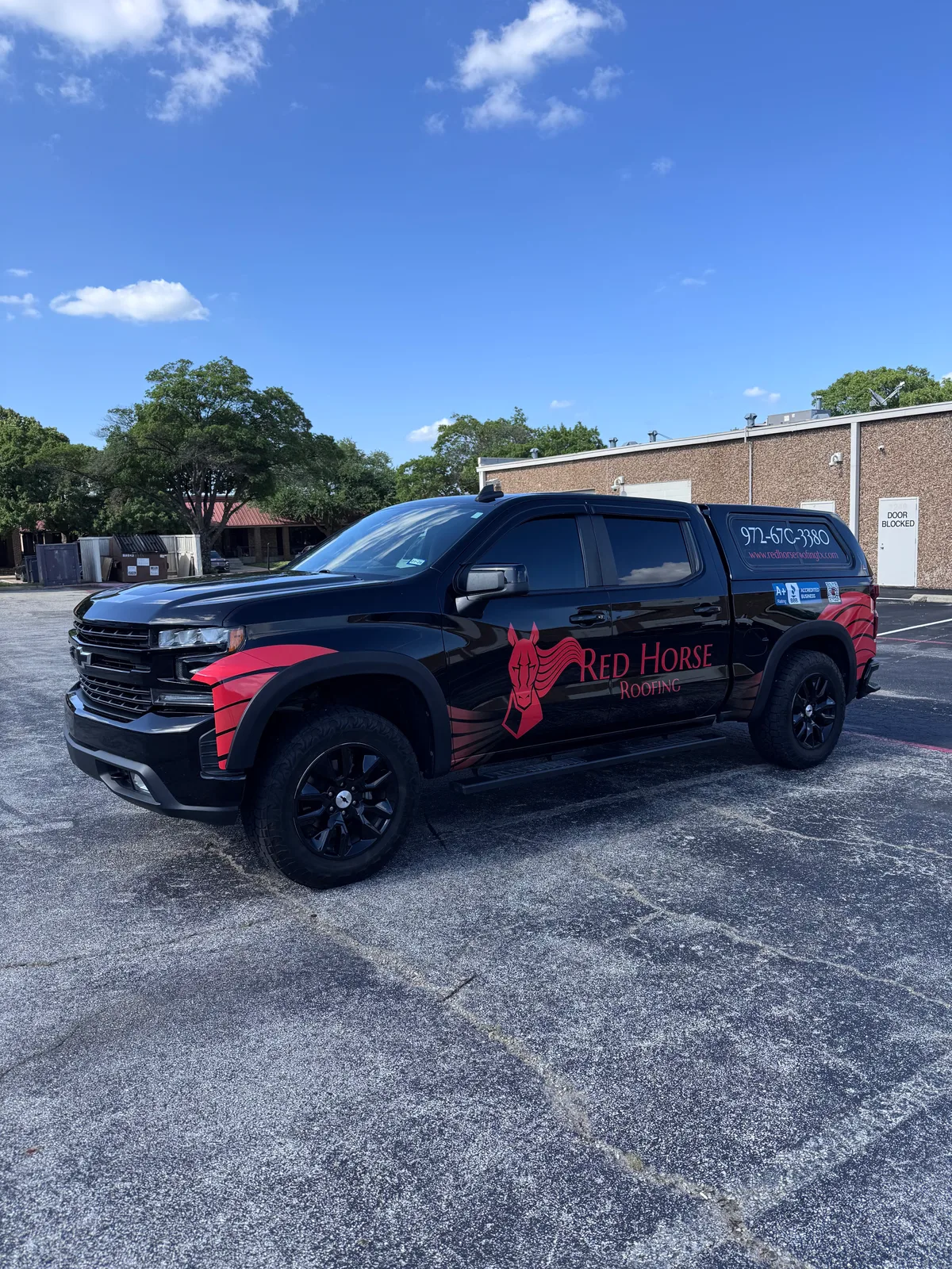 Spot graphics on a Chevrolet Silverado truck in Garland, TX
